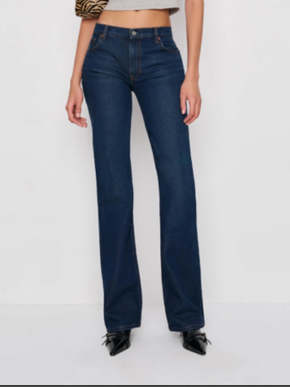 Reformation 	
Sharon Stretch Mid Rise Bootcut Jeans color:
Nemi